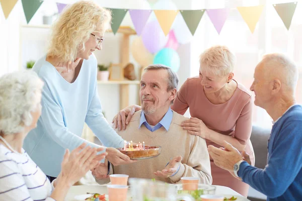 Smiling Attractive Woman Glasses Bringing Birthday Cake Candles Birthday Man — Stock Photo, Image