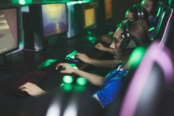 Group Serious Young Men Headsets Sitting Line Using Computers While — Stock Photo, Image