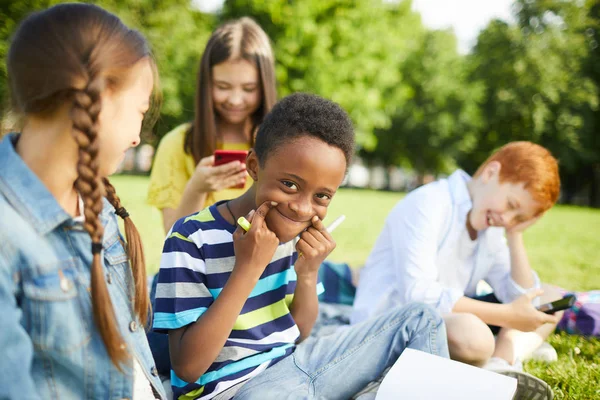 Teenage Afro American Schoolboy Striped Shirt Making Funny Faces While — Stock Photo, Image