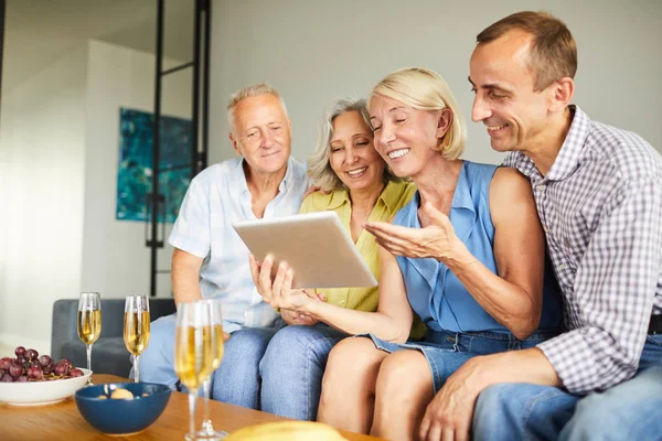 Group Contemporary Adult People Using Digital Tablet Sitting Sofa Home — Stock Photo, Image