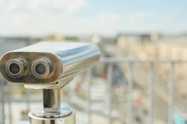 Background image of stationary binoculars on rooftop viewing platform, copy space
