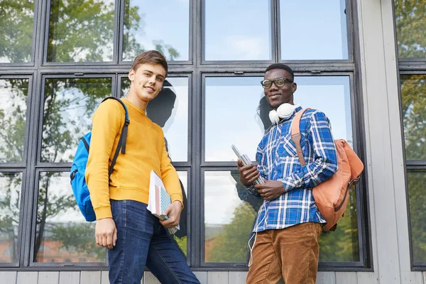 Portrait Two College Students Holding Books Posing Outdoors Campus Looking — Stock Photo, Image