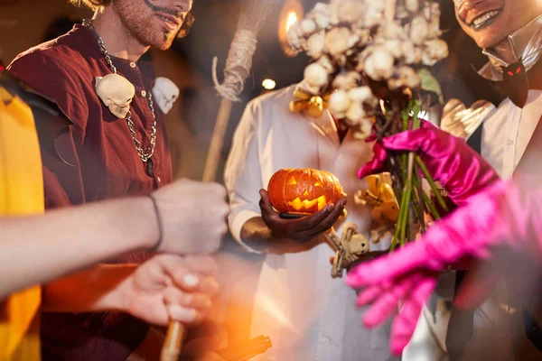 Cropped Shot People Wearing Halloween Costumes Holding Carved Pumpkin Party — Stockfoto