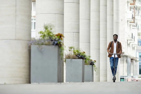 Wide Angle Portrait Contemporary African Man Riding Electric Scooter City — Stockfoto