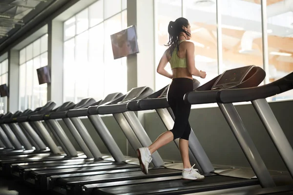 Full Length Wide Angle Portrait Young Woman Running Treadmill Alone — Stock Photo, Image