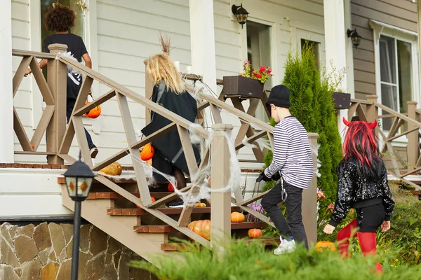 Full Length Portrait Children Trick Treating Halloween Standing Porch Copy — Stock Photo, Image