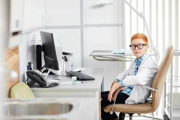 Portrait Cute Red Haired Boy Posing Doctor Wearing White Coat — Stok fotoğraf