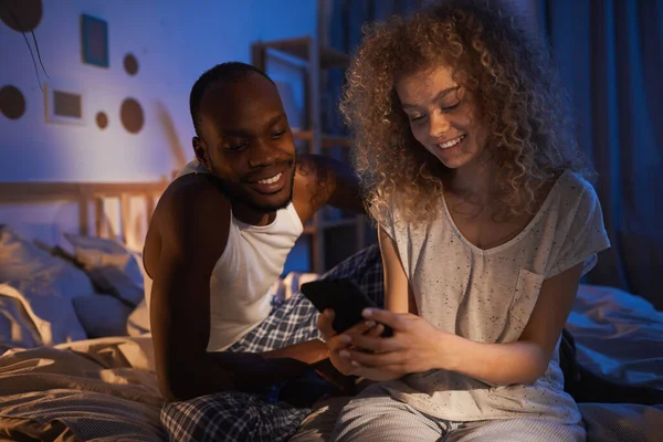 Portrait Young Mixed Race Couple Sitting Bed Night Smiling Happily — Stock Photo, Image