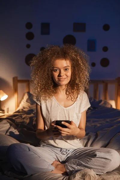 Vertical Full Length Portrait Curly Haired Young Woman Sitting Bed — Stock Photo, Image