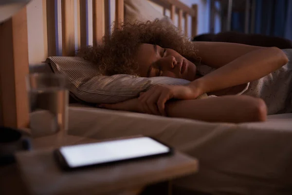 Portrait Curly Haired Young Woman Sleeping Calmly Bed Night Lit — Stock Photo, Image