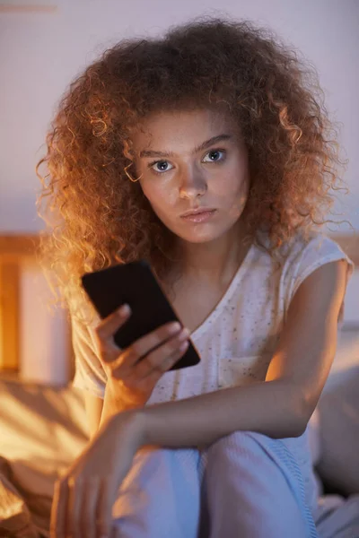Vertical Portrait Young Curly Haired Woman Using Smartphone While Sitting — Stock Photo, Image
