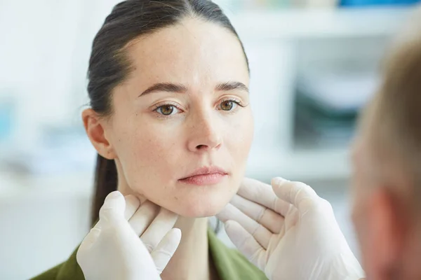 Unrecognizable Doctor Palpating Neck Throat Young Woman While Checking Her — Stock Photo, Image