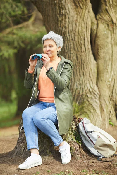 Vertical Full Length Portrait Active Senior Woman Holding Binoculars Smiling — Stock Photo, Image