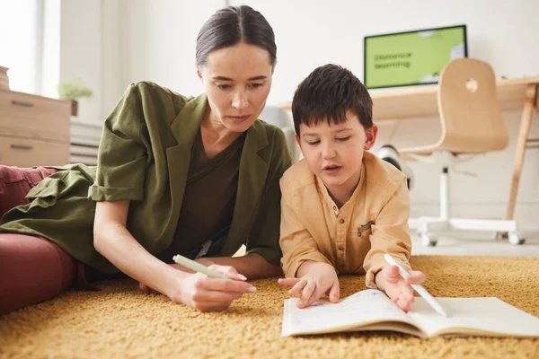 Portrait Young Mother Laying Floor Cute Son Drawing Pictures Copy — Stock Photo, Image