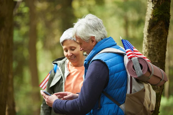 Side View Active Senior Couple Using Mobile App Smartphone While — Stock Photo, Image