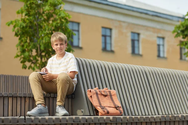 Full Length Portrait Blonde Teenage Boy Looking Camera While Sitting — Stock Photo, Image