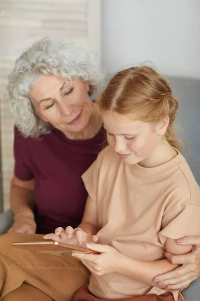 Vertical High Angle Portrait Cute Red Haired Girl Teaching Grandma — Stock Photo, Image
