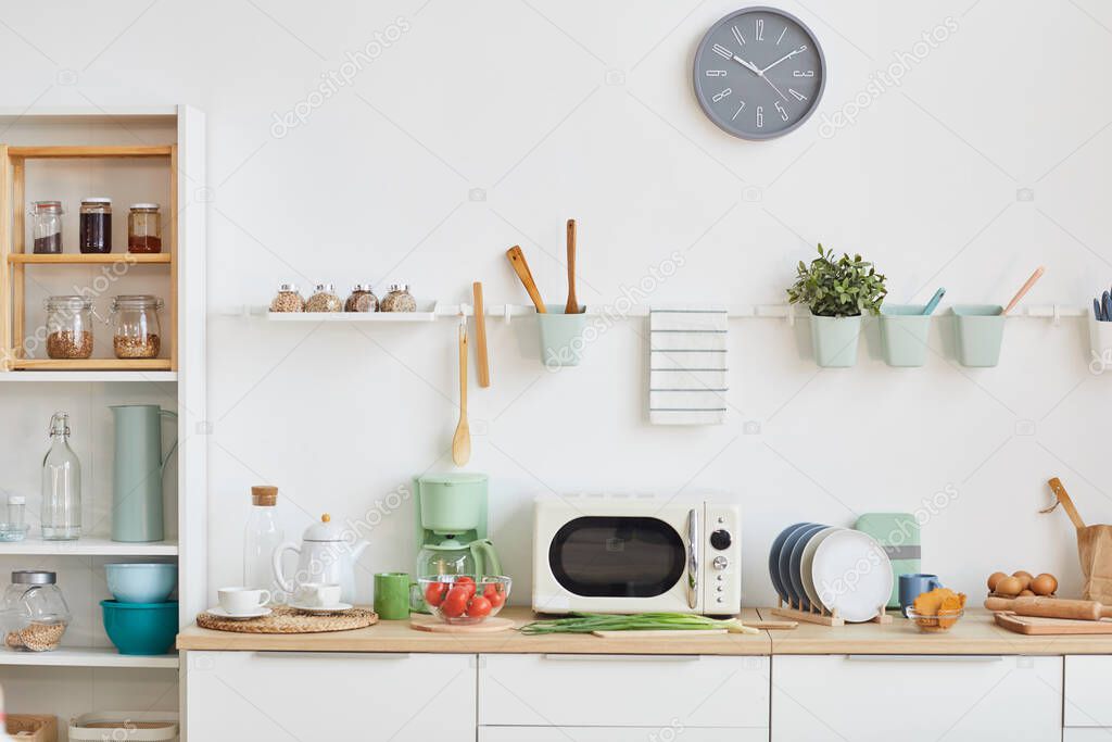 Front view background image of minimal kitchen interior with wooden accents in small and cozy apartment, copy space