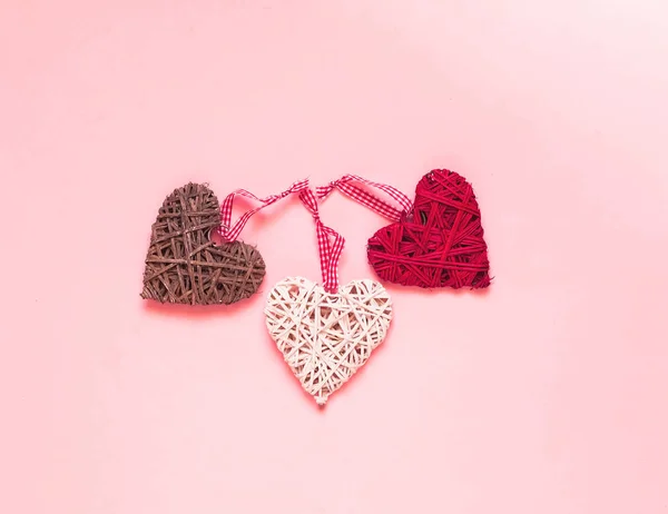 Valentines Day concept. Creative paper background with wicker hearts.  Pink trendy color. — Stock Photo, Image