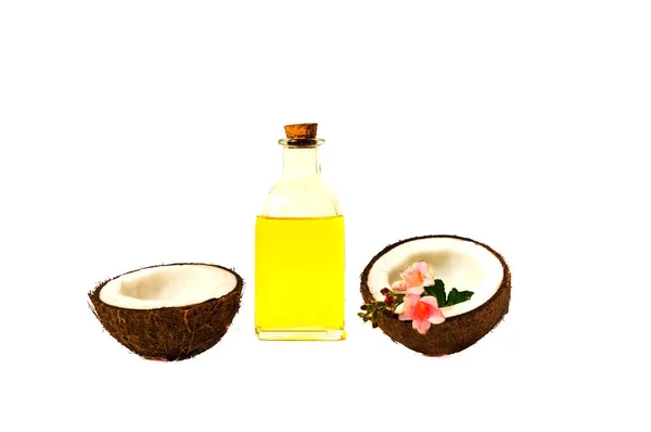 Coconut oil and fresh coconuts isolated on white background. — Stock Photo, Image