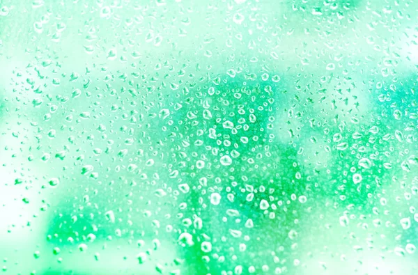 Bubbles of water on mint color background.Trendy colors — Stock Photo, Image