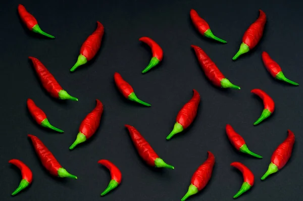 Pattern Small Red Peppers Dark Background Close Creative Copy Space — Stock Photo, Image