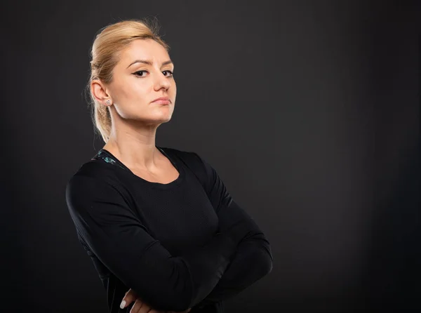 Portrait Pretty Gym Female Trainer Standing Arms Crossed Looking Serious — Stock Photo, Image