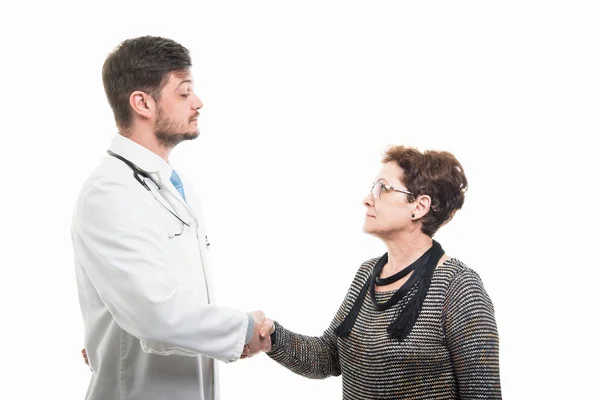 Male Doctor Female Senior Patient Shaking Hands Closing Deal Isolated — Stock Photo, Image