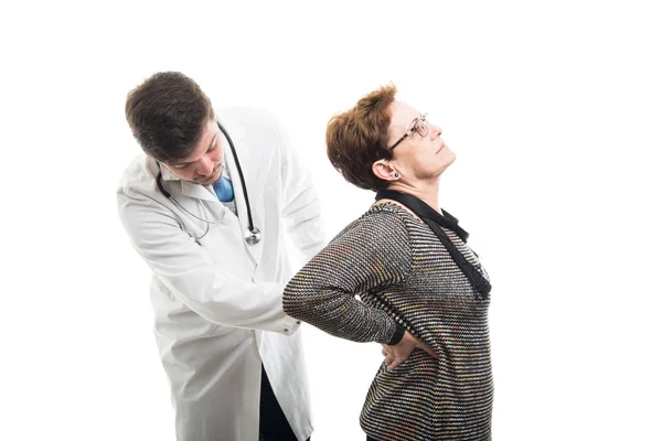 Médico Masculino Checando Paciente Sênior Feminino Volta Isolado Fundo Branco — Fotografia de Stock