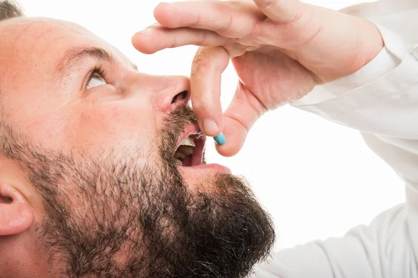 Close Male Doctor Taking One Pill Isolated White Background Copyspace — Stock Photo, Image