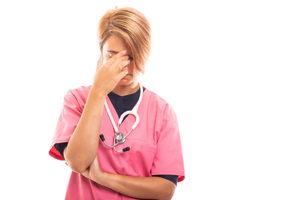 Retrato Veterinaria Femenina Con Exfoliante Rosa Que Muestra Gesto Migraña —  Fotos de Stock