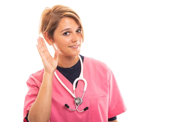 穿粉红色擦洗的女兽医肖像在白色背景下无法听到与 Copyspace 广告区的手势 — 图库照片