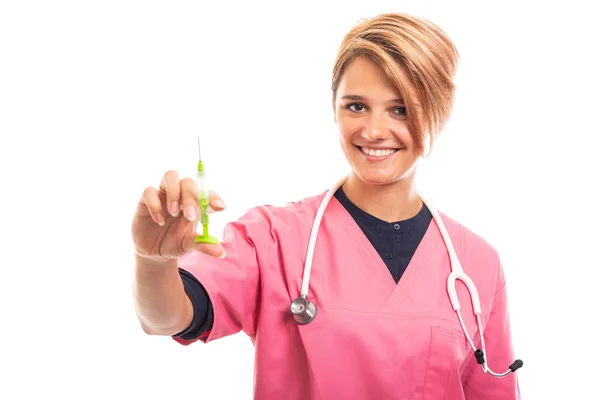 Portrait Female Vet Wearing Pink Scrub Showing Green Syringe Isolated Stock Picture