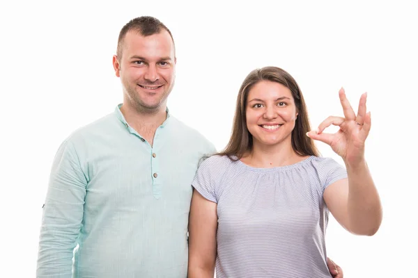 Portrait Young Happy Couple Showing Gesture Isolated White Background — Stock Photo, Image