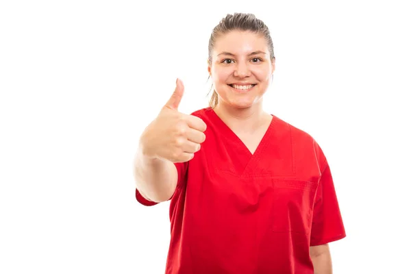 Retrato Jovem Enfermeira Médica Vestindo Esfoliação Vermelha Mostrando Gesto Polegar — Fotografia de Stock