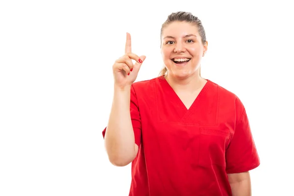 Portrait Young Medical Nurse Wearing Red Scrub Showing Got Idea — Stock Photo, Image