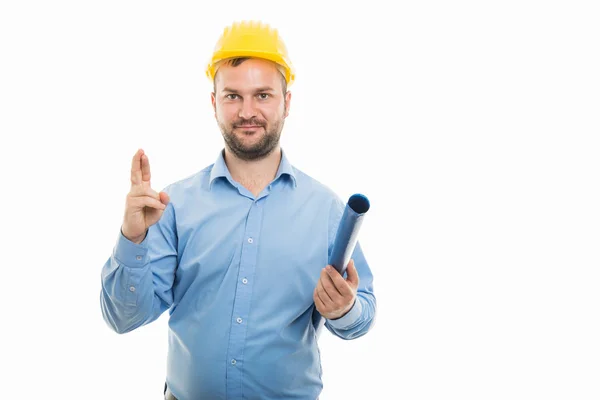 Portrait Young Architect Holding Blueprints Showing Cross Fingers Gesture Isolated — Stock Photo, Image