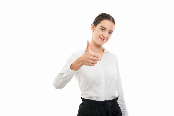 Copyspace 折込広告エリアで白い背景で隔離のジェスチャーを親指を示す若いかなり公務員女性の肖像 — ストック写真