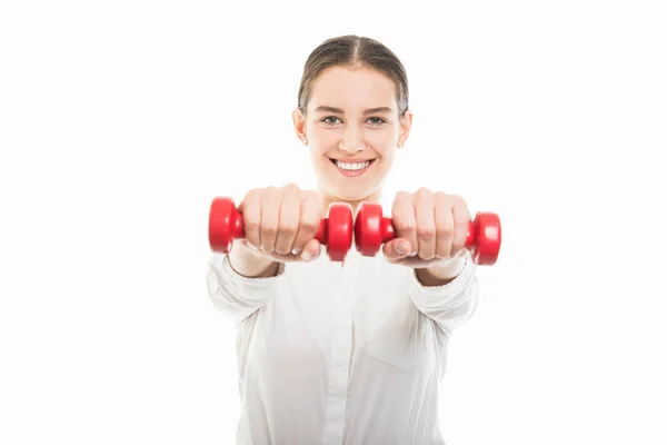 Young pretty business woman working out with dumbbells — Stock Photo, Image