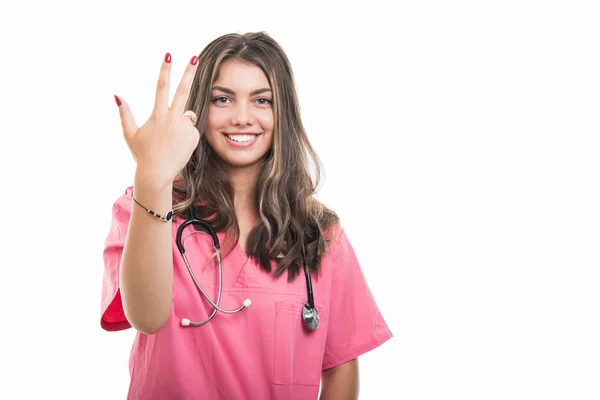 Retrato Hermoso Médico Joven Con Uniformes Que Muestran Número Tres —  Fotos de Stock