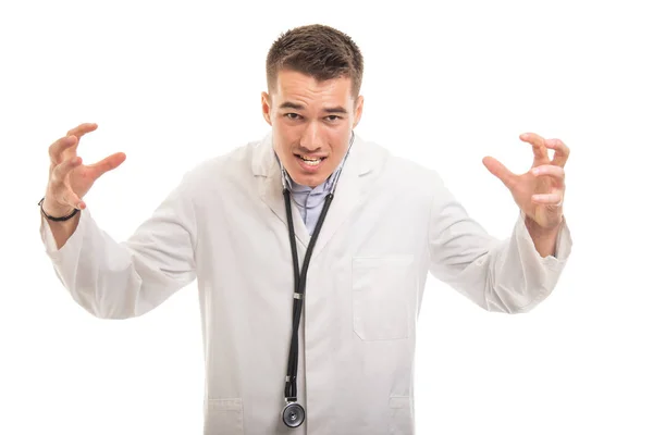 Portret młodego przystojnego lekarza bardzo szalony — Zdjęcie stockowe