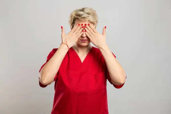 Portrait Young Attractive Female Nurse Covering Eyes Blind Gesture Grey — Stock Photo, Image