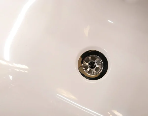 Chrome drain hole in clean sink