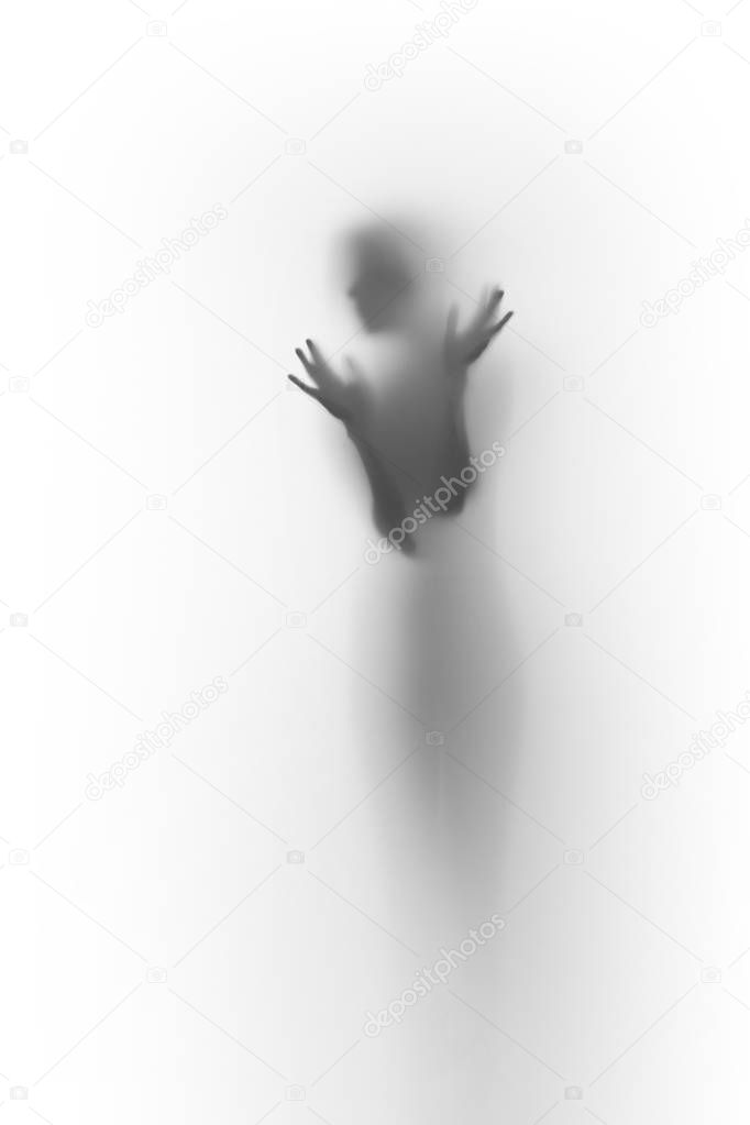 Blurry diffuse woman body silhouette is behind a curtain, black and white colors, hands, fingers and face contour can be seen only