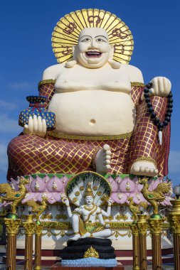 Buda adası Koh Samui, Tayland tarihinde servet heykelinin gülümseyen