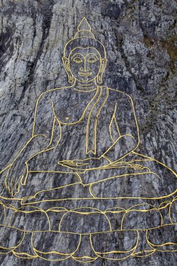 Golden Big Buddha on the mountain Khao Chi Chan, Pattaya, Thailand. Close up clipart