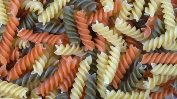 Fondo Pasta Multicolor Giratorio Vista Superior Rotación Pasta Espiral Coloreada — Vídeo de stock