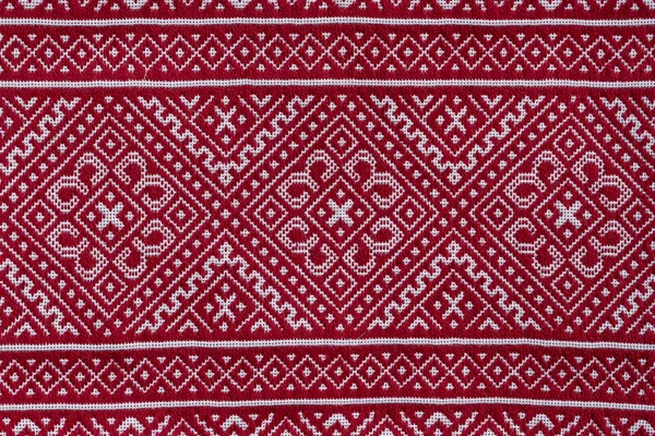 Detail Ukrainian folk wedding towel texture for background. Embroidered good by cross-stitch pattern. Ukrainian national ethnic ornament, close up