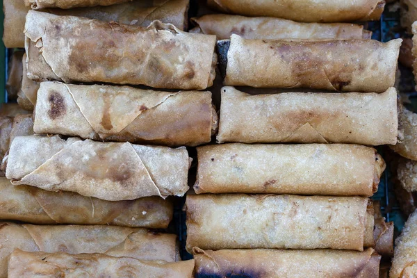 Fried flour roll for sell in street food market, Thailand, closeup wrapped pancakes — Stock Photo, Image