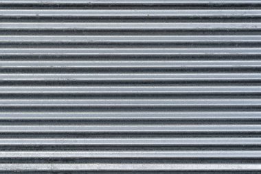 Metal duvar dokusu, arka plan. Bina yapıları için nervürlü galvanizli metal levha. Bu çitlerin inşası için çatılar kaplama kıdamak için kullanılır